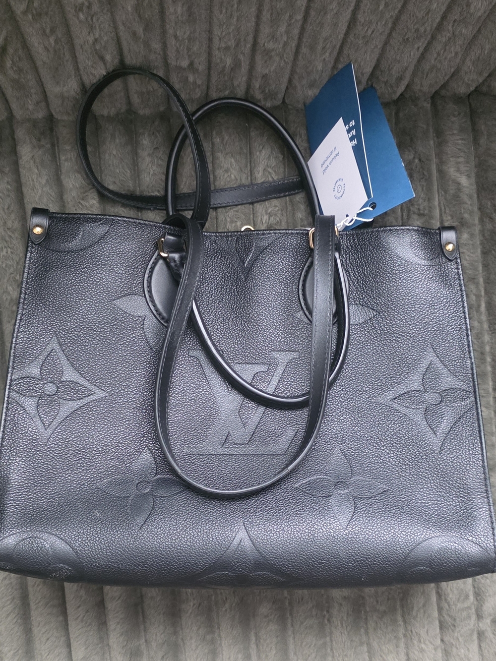 Authentic Louis Vuitton Black On The Go MM